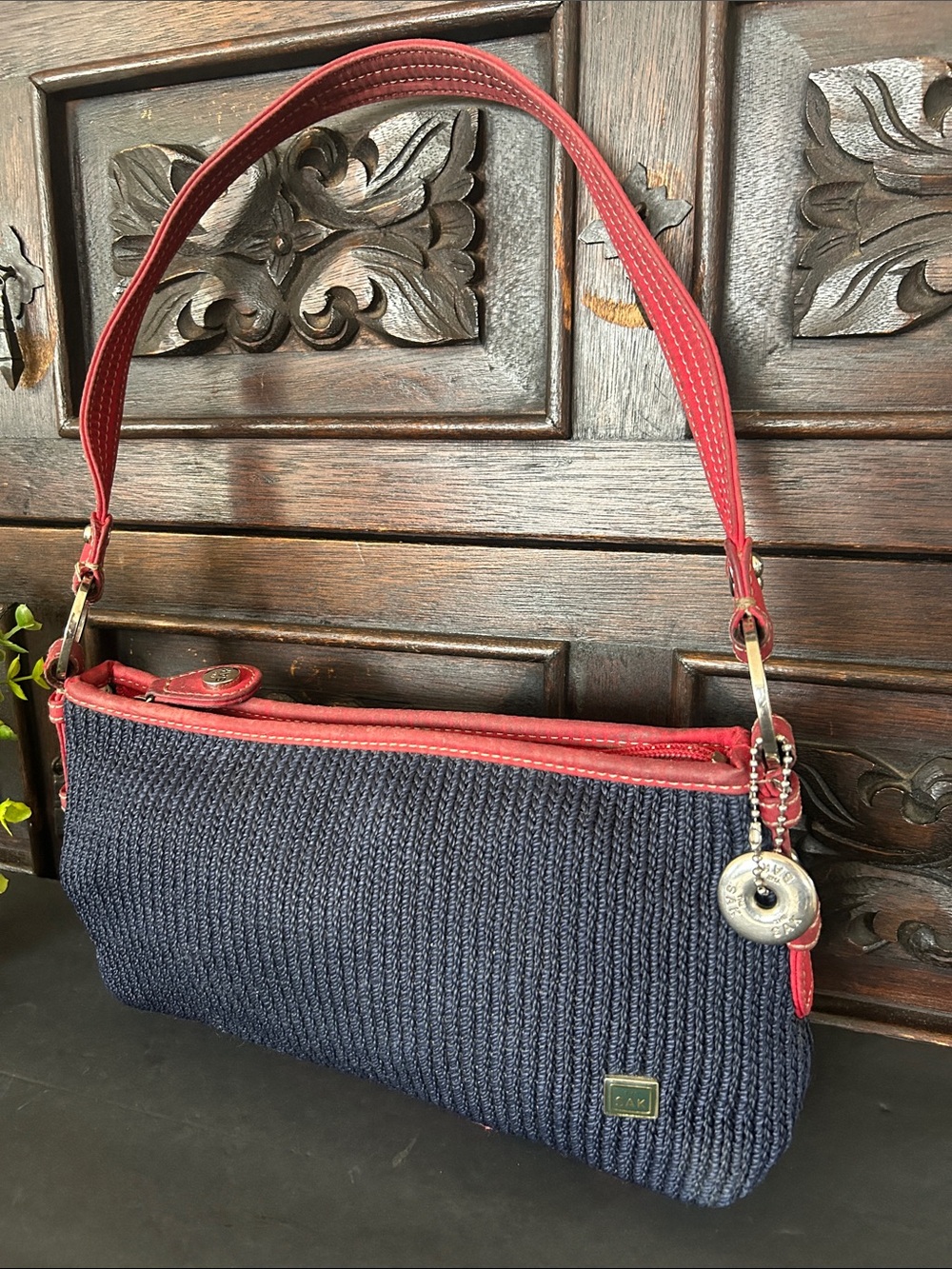 The Sak Navy Blue Crochet Woven Shoulder Bag with Red Trim